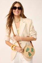 Canteen Crossbody Turtles in Woven Faux Straw